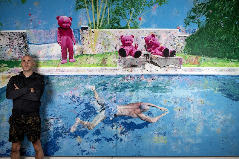 LUAP artist Paul Robinson stood in front of his giant painting Portrait Of An Artist (One Figure And Three Bears) After Hockney